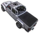 Sun shade top for Jeep Gladiator JT by SpiderWebShade; black printed shade with logo on silver Jeep.