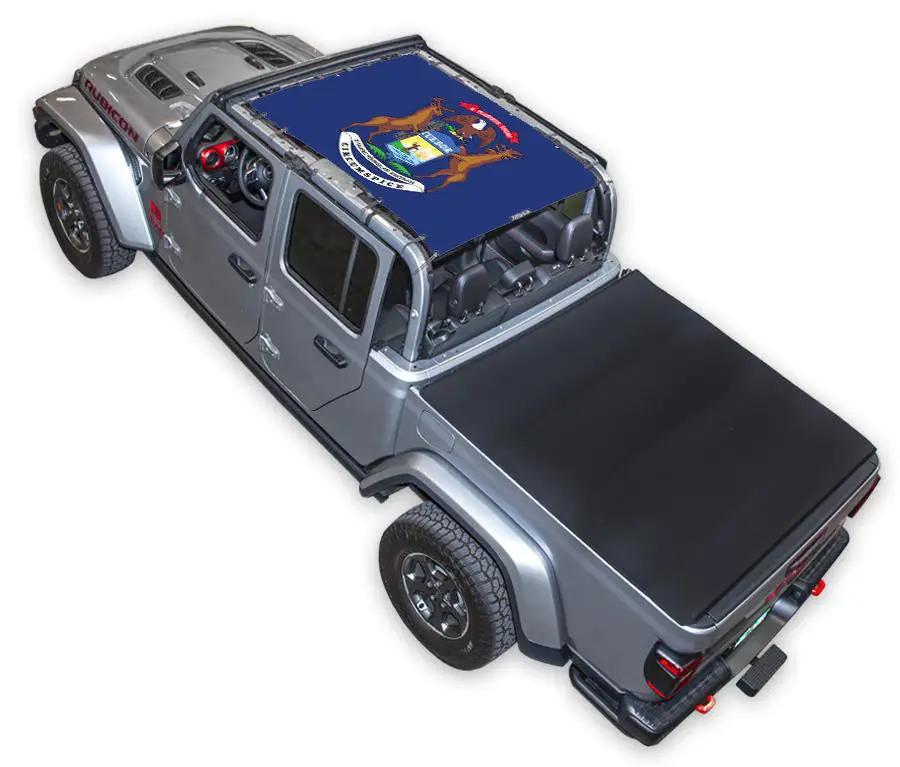 SPIDERWEBSHADE sun shade top for Jeep Gladiator JT (2019–2026); stock printed blue shade with crest design.