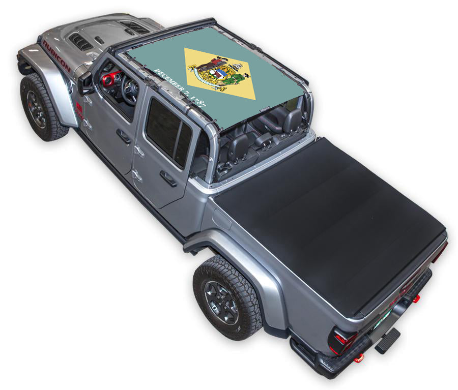 Sun shade for Jeep Gladiator JT by SpiderWebShade; stock-printed top with flag emblem