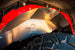 Artec JL Rear Inner Fenders, metal panels with rivets and red wheel-arch lip