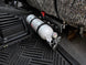 OBS Ford Fire Extinguisher Mount JC Customs—white extinguisher secured in black metal bracket under the seat