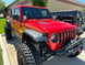 Artec JL-JT A-Pillar Single Surface Light Mount for Jeep JL/JT with round LED pods on a red Wrangler