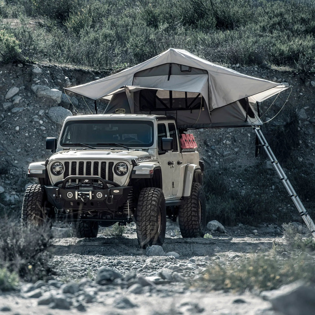 Gen2 Overlander Standard Tent by Smittybilt, gray, mounted on a Jeep roof rack
