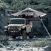 Gen2 Overlander Standard Tent by Smittybilt, gray, mounted on a Jeep roof rack