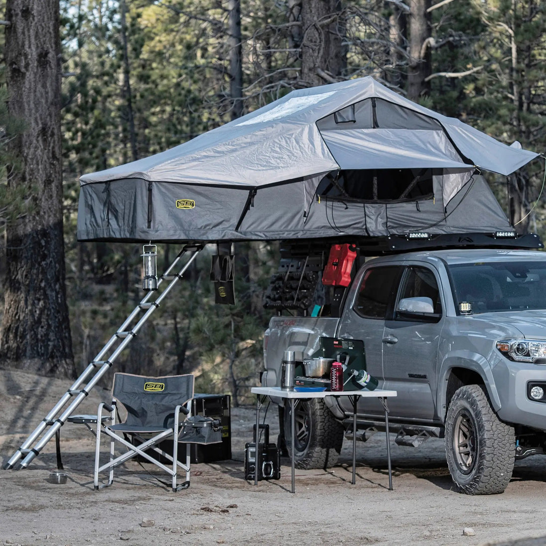 Gen2 Overlander XL Tent on SUV roof rack, gray, by Smittybilt