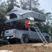 Gen2 Overlander XL rooftop tent gray by Smittybilt on a Toyota Tacoma 4x4 with ladder.