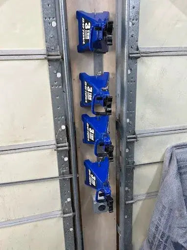 4Link4WD Jack Stand Wall Mount Hanger holding five blue Daytona/Pittsburgh/Universal 3-6 Ton stands