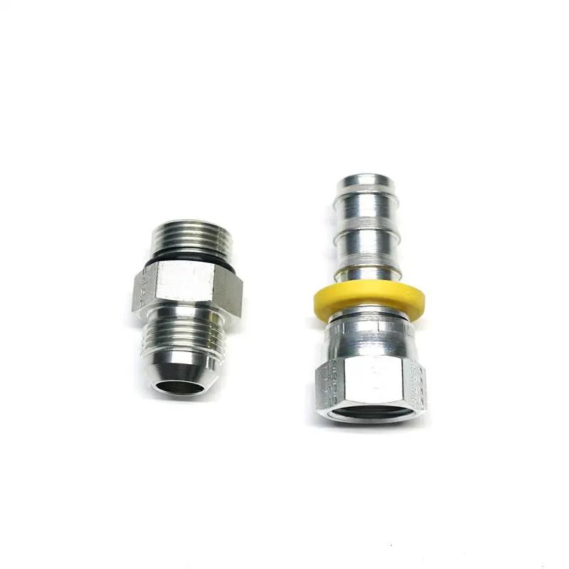 Power Driven 5/8 Feed Fitting Kit - two metal fuel-line fittings, one with yellow gasket