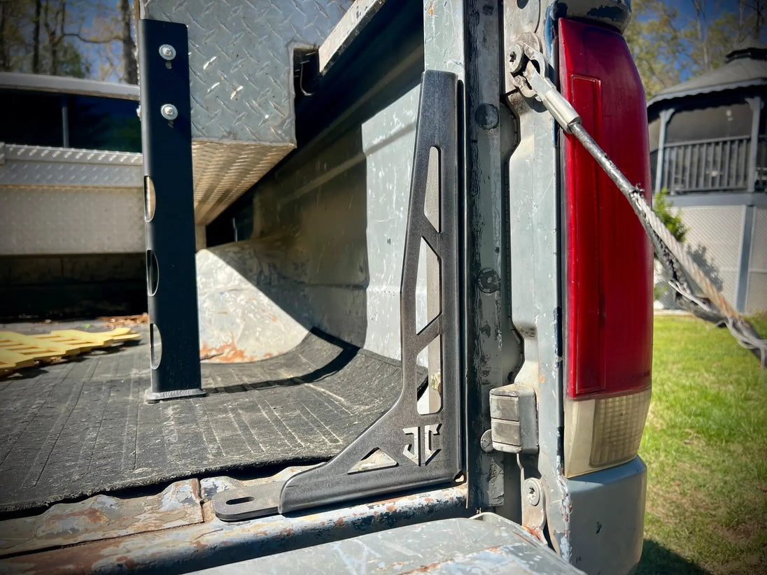 JC Customs Bed Stiffeners/Bed Tie Downs for 1980-1997 Ford F-Series pickup; black metal brackets along bed rail