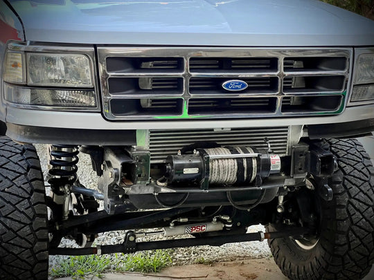 JC Customs OBS Ford Hidden Winch Mount under front bumper with winch and rope visible