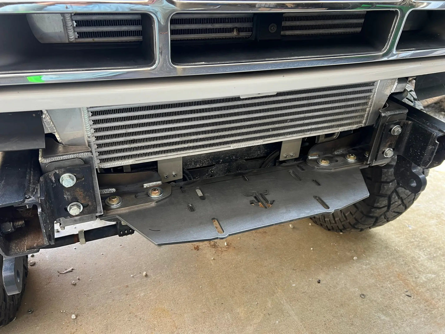 JC Customs OBS Ford Hidden Winch Mount – front bumper, black steel mounting plate visible