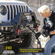 Smittybilt X20 Gen 3 10K electric winch with synthetic rope on rugged off-road Jeep bumper