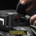 X20 Gen3 12K winch by Smittybilt being operated; hand presses red ON switch on black winch controller