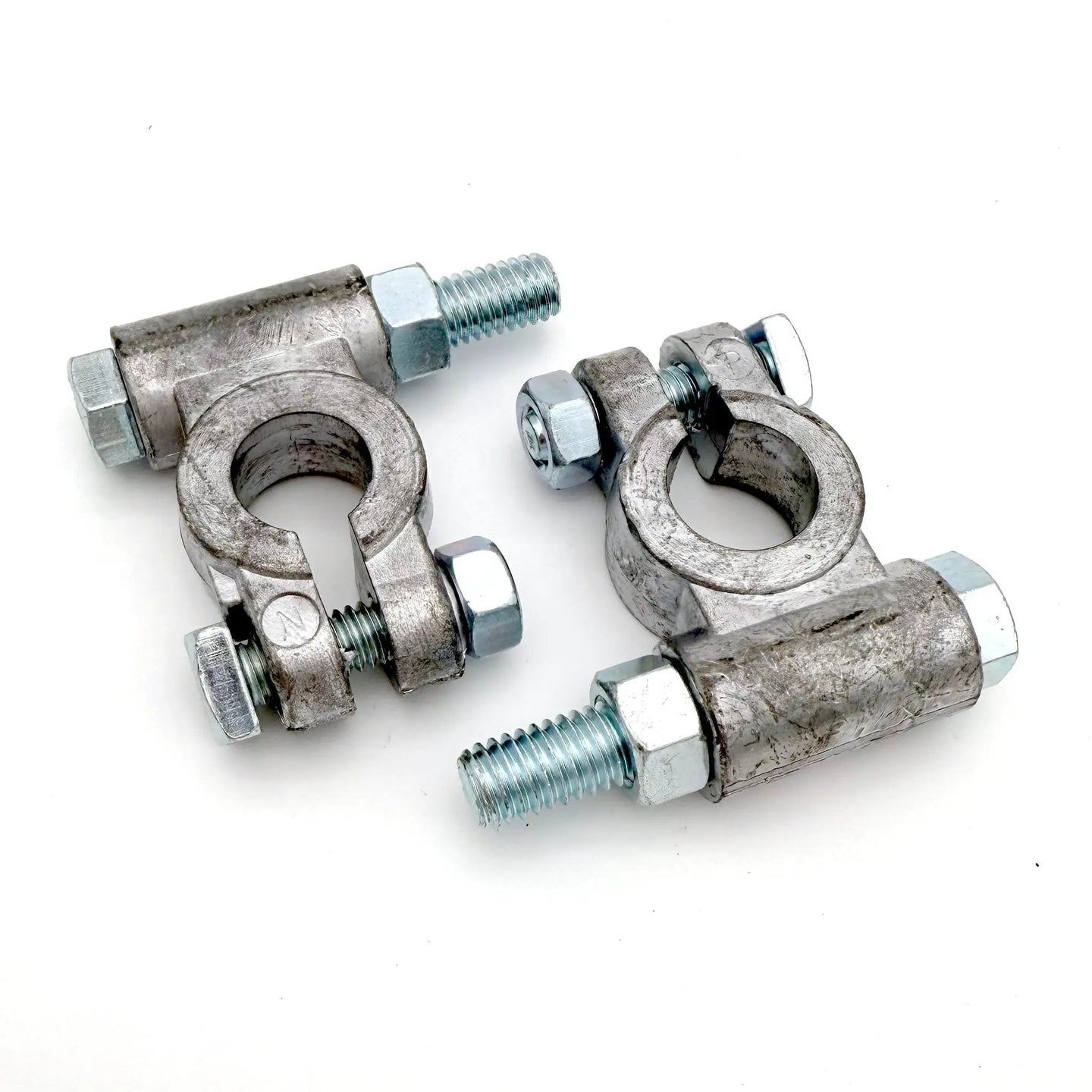 Dodge Cummins 3rd Gen Battery Cable Kit hardware with battery terminal clamps and mounting bolts.