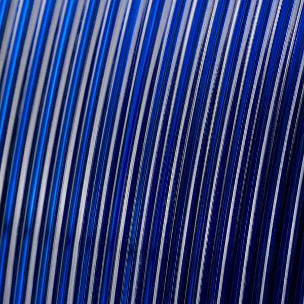 PETG Translucent filament for 3D printers, blue, close-up of translucent strands