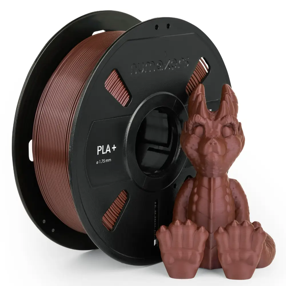 PLA+ filament spool by Numakers in brown beside a dragon figurine, 1.75 mm 3D printer accessory