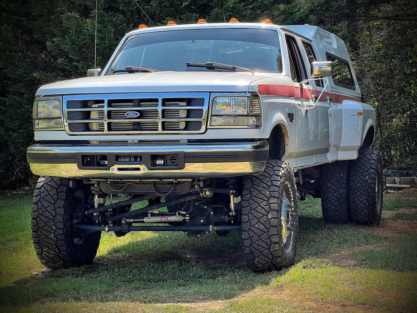 JC Customs OBS Ford Hidden Winch Mount on white Ford OBS pickup with camper shell