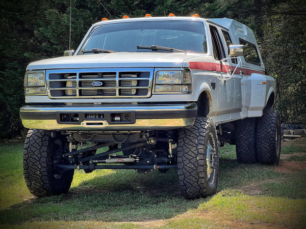 JC Customs OBS Ford Hidden Winch Mount on white Ford OBS pickup with camper shell