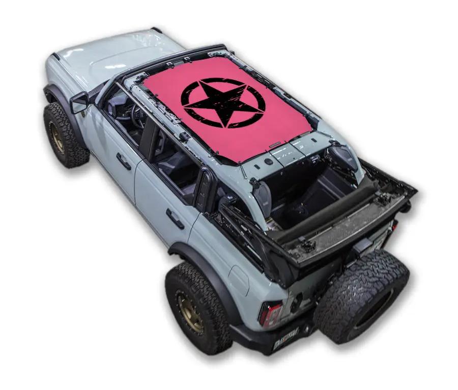 Sun shade for Ford Bronco 2021–2026 by SPIDERWEBSHADE, pink stock print with black star logo