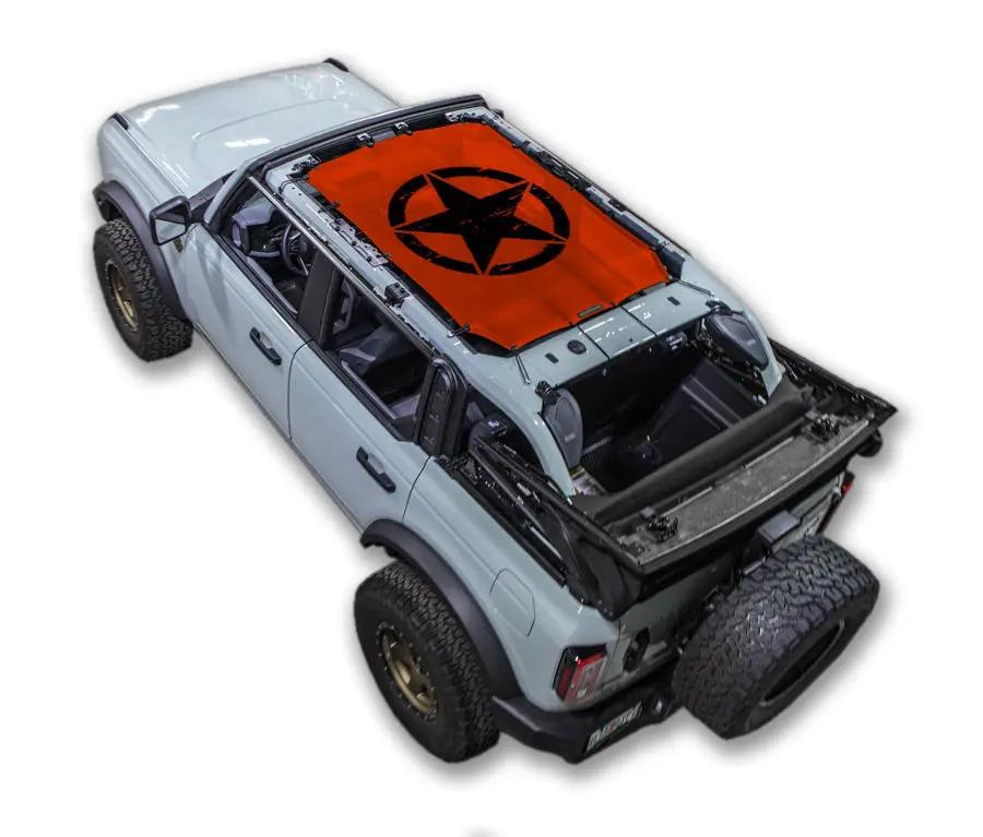 SPIDERWEBSHADE sun shade top on Ford Bronco with orange printed star design