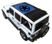 SpiderWebShade sun shade for Jeep Wrangler JLU; blue stock printed shade top with star emblem on white SUV