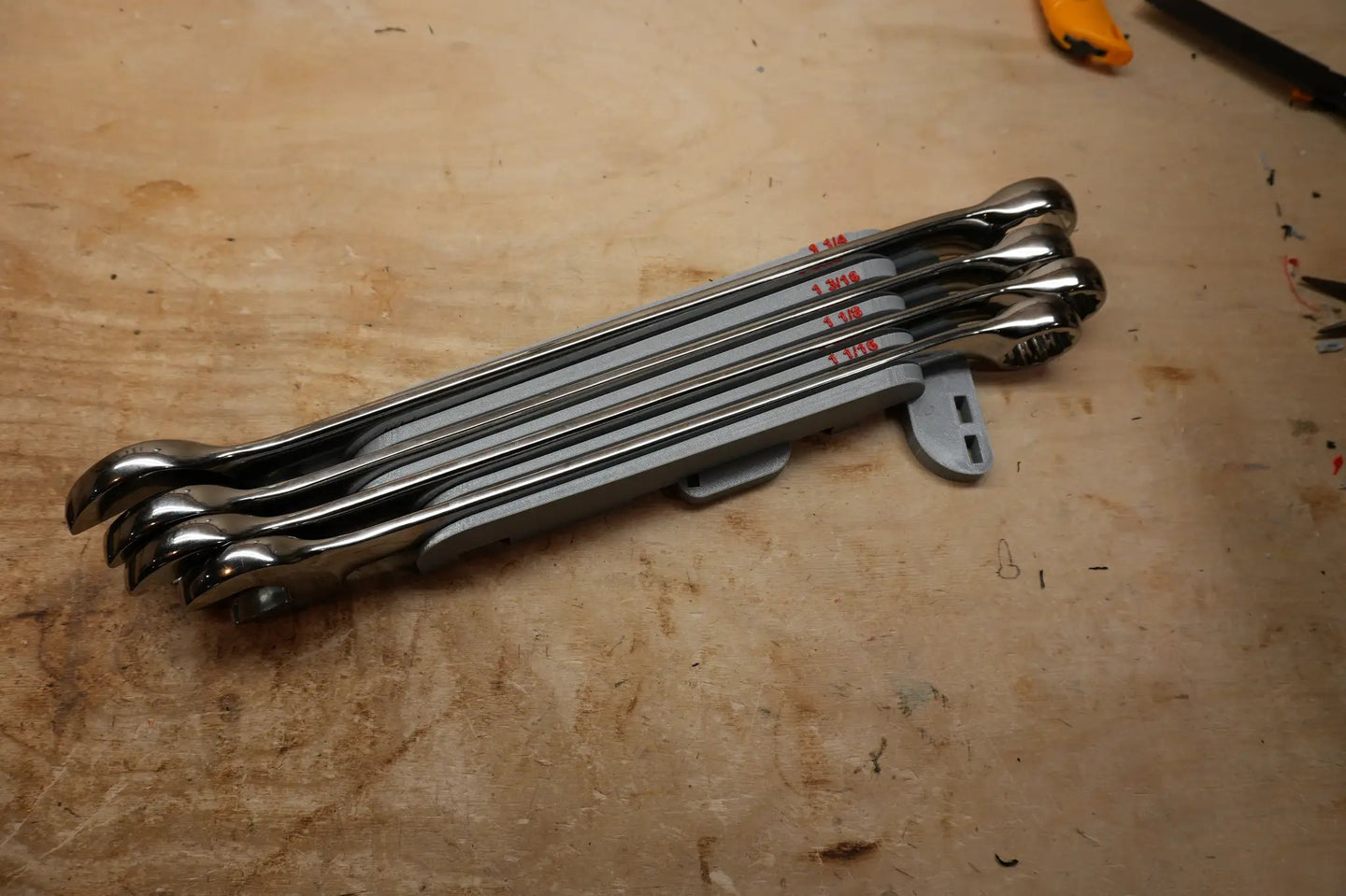 Packout Drawer Inserts for ICON Large Combination Wrench Set ICW-S D LF, five chrome wrenches in gray insert on wooden workbench