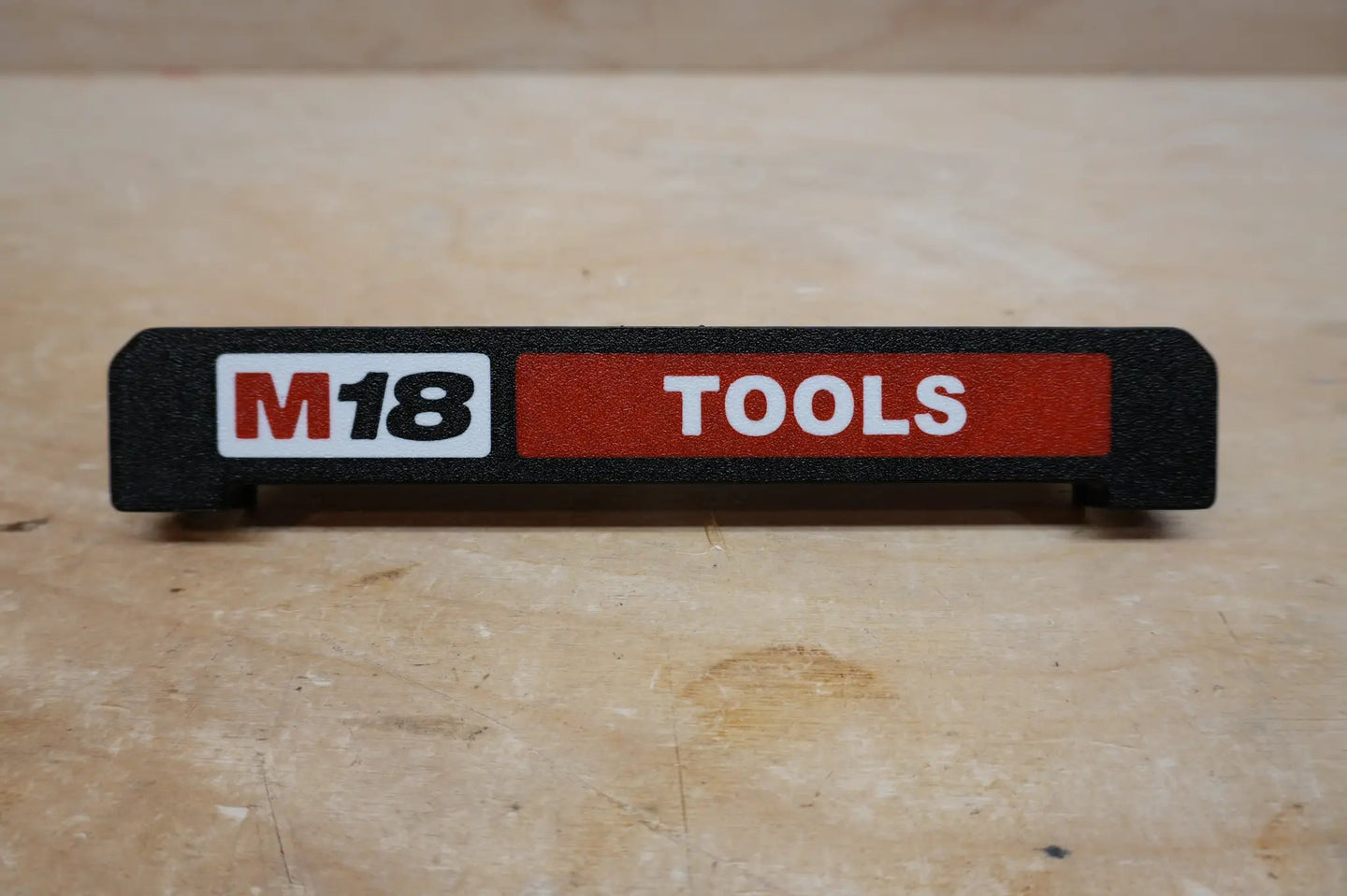 Packout PRDH rolling drawer handle on black base with Milwaukee M18 Tools branding