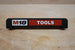Packout PRDH rolling drawer handle on black base with Milwaukee M18 Tools branding