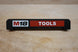 Packout PRDH rolling drawer handle on black base with Milwaukee M18 Tools branding