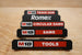 Packout Rolling Drawer Handles PRDH by 10-Spot Tools, black plastic, shown stacked with M18 tool labels