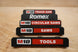 Packout Rolling Drawer Handles PRDH by 10-Spot Tools, black plastic, shown stacked with M18 tool labels