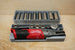 Packout SideCar Insert for M12 FUEL 1/2-in Ratchet, gray organizer with socket tray; Milwaukee red tool visible