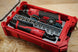 Packout SideCar Insert for M12 3/8 Ratchet ScMR2457 in red Milwaukee Packout case with socket rail and abrasive discs
