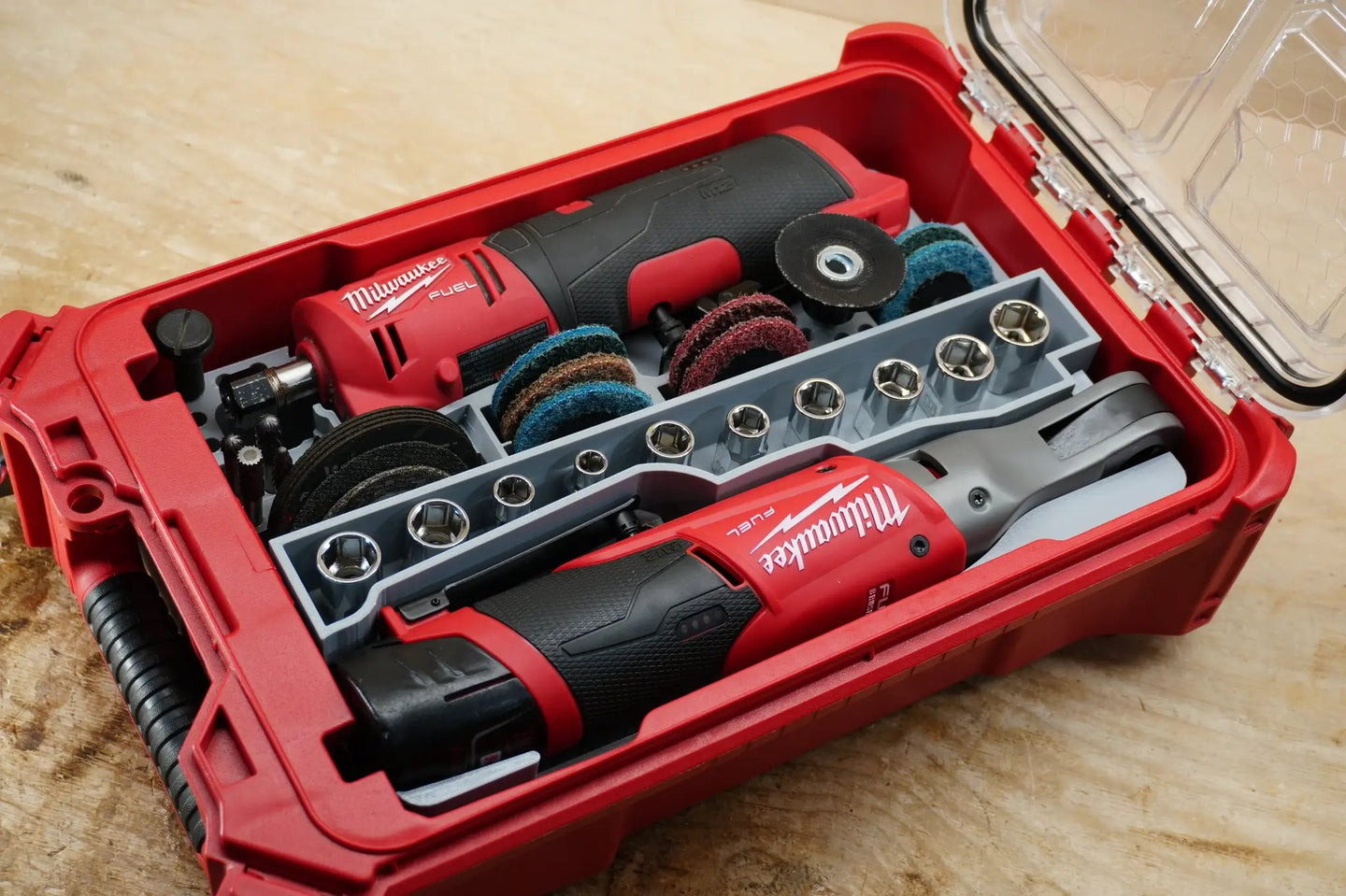 Packout SideCar Insert Milwaukee M12 FUEL 3/8 in High Speed Ratchet ScMR2567 inside red case with gray socket rail and abrasive discs