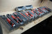 Packout SideCar Flex Bin Inserts ScEB gray plastic with Milwaukee cordless drills stored in rows