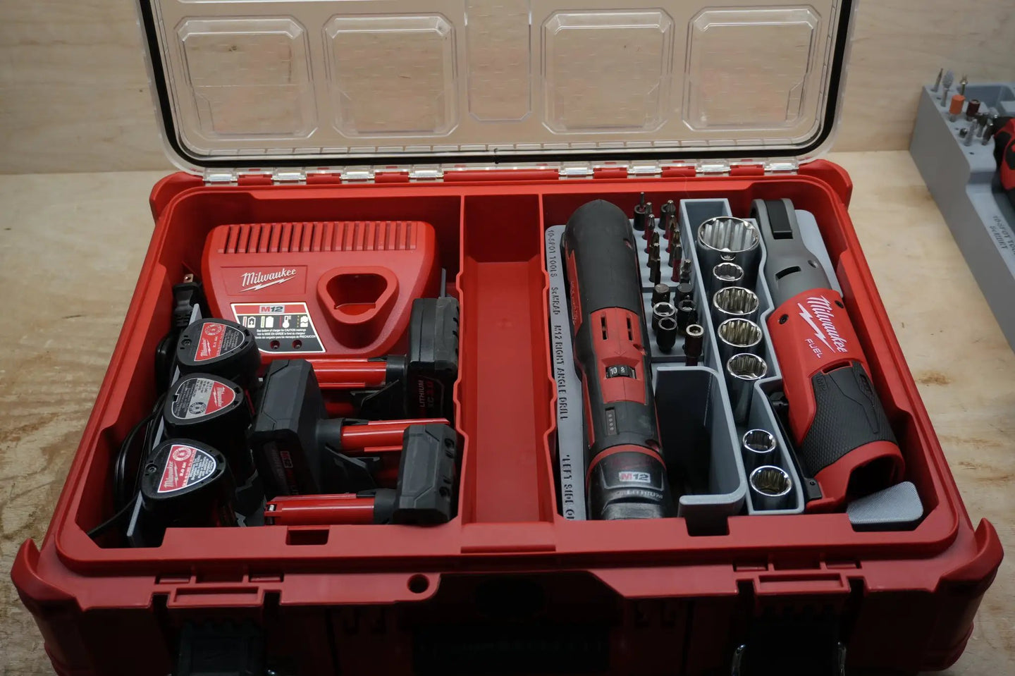 Packout SideCar Insert for M12 FUEL 1/2in Ratchet - Milwaukee red tool case with gray socket tray and bits
