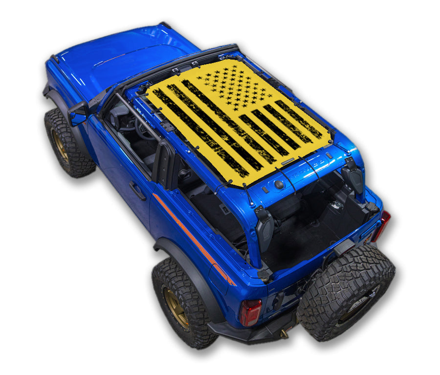 Ford Bronco sun shade top stock-printed yellow flag design on blue roof