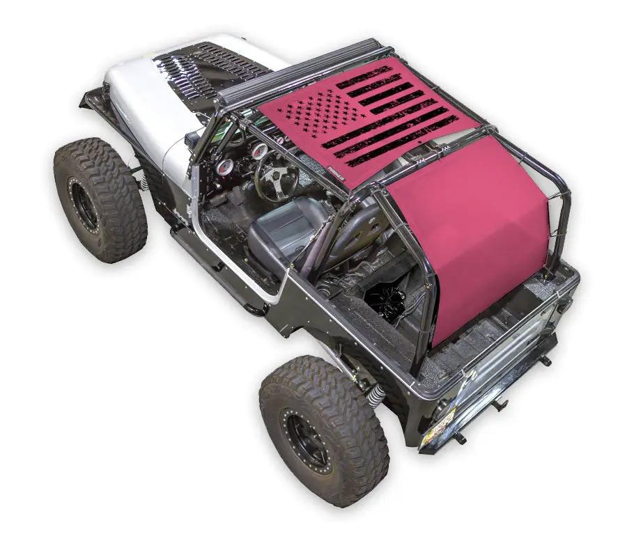Sun shade for Jeep Wrangler YJ (1987–1996) by SPIDERWEBSHADE, pink stock printed shade top with flag design.
