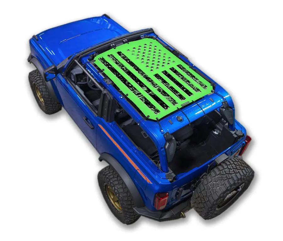 Sun shade for Ford Bronco (2021–2026) by SpiderWebShade; bright green printed flag top on blue Bronco