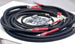 Battery cable replacement harness for Dodge/RAM Cummins 4th Gen (2010–2018) by Big7Kits; black braided cables with red ends