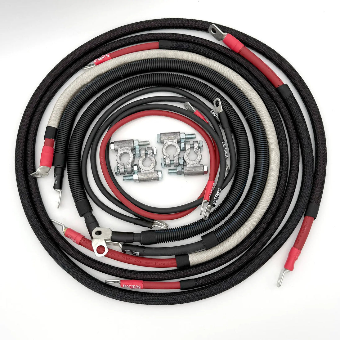 Battery cable kit for Dodge Cummins 3rd Gen (2003–2009) with braided black sleeves and red/black leads by Big7Kits