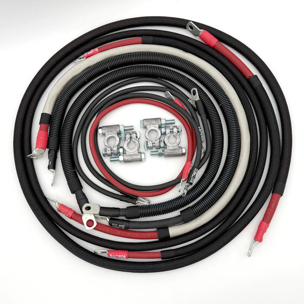 Battery cable kit for Dodge Cummins 3rd Gen (2003–2009) with braided black sleeves and red/black leads by Big7Kits