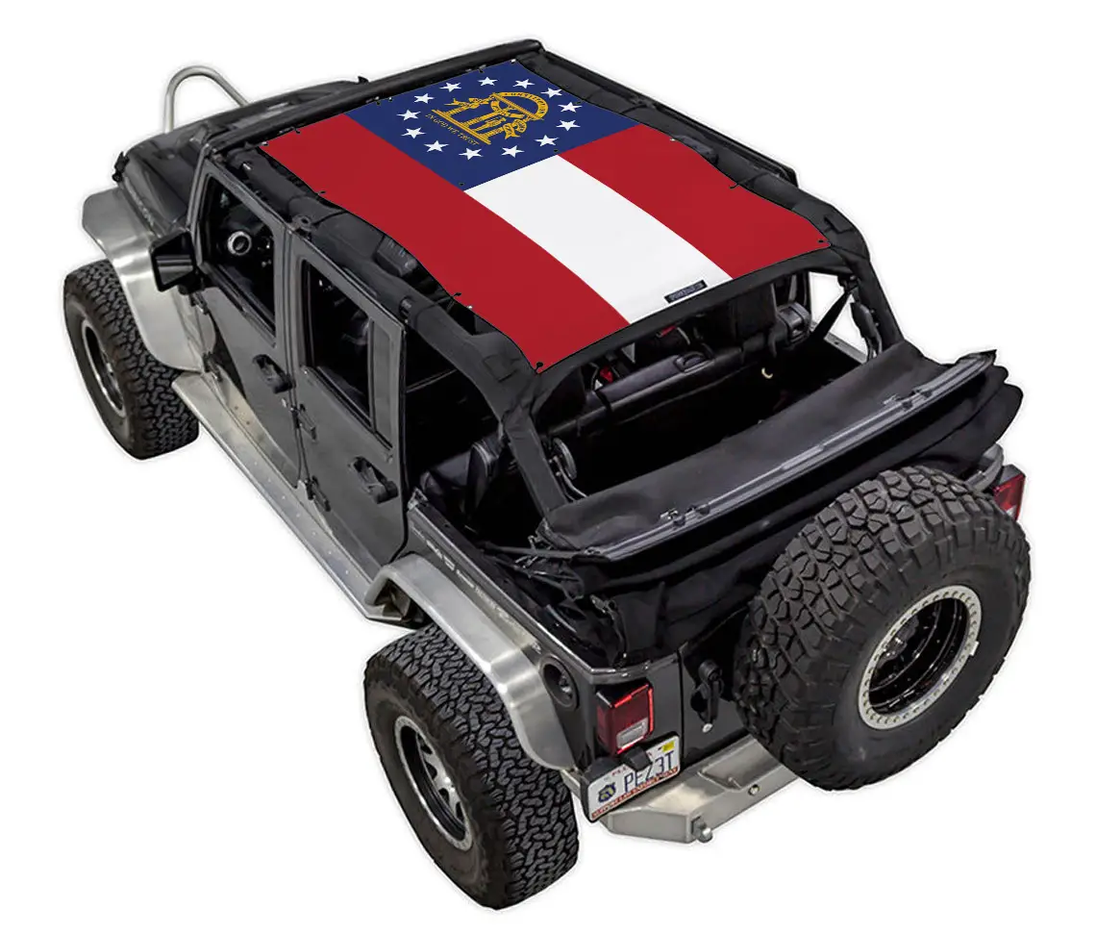 Sun shade for Jeep Wrangler JKU 4-Door by SpiderWebShade; flag-themed red, white, blue top.