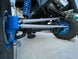Artec Crossover Weld-On High Steer Arms for 05+ Ford Super Duty — silver arms with blue suspension hardware