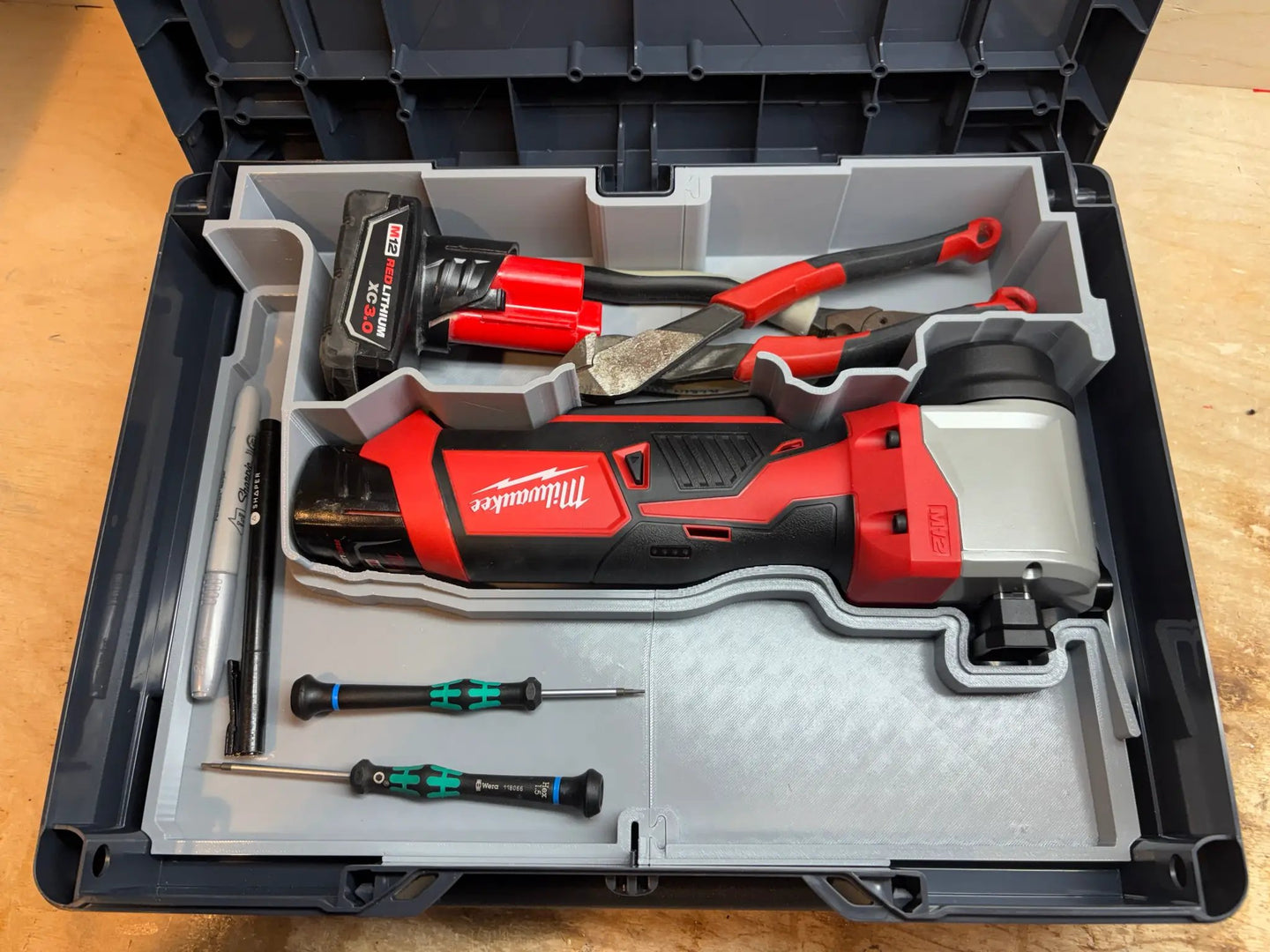 10-Spot Tools Systainer Insert for M12 Cable Stripper SYS-MCM12; grey tool box insert with Milwaukee M12 battery and red cordless tool