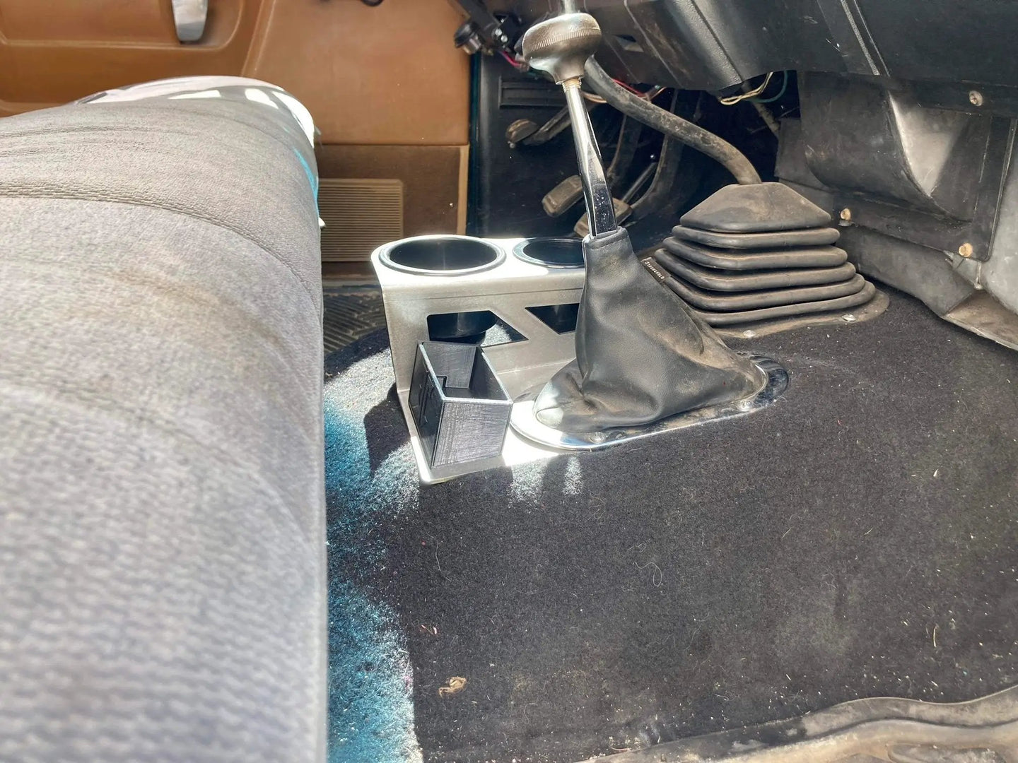 JC Customs 1st Gen Dodge Ram Shifter Mounted Cup Holder, silver base with dual cup holders beside the shifter