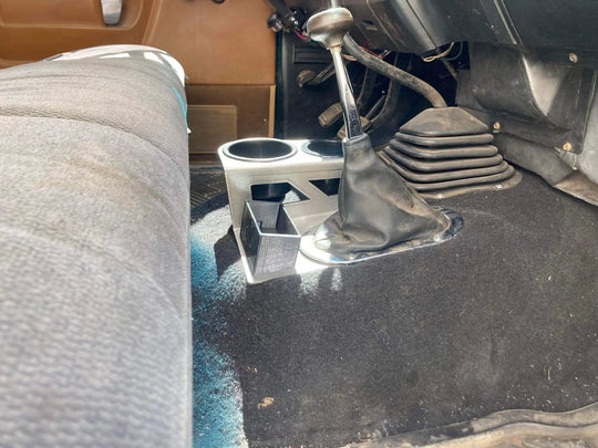 JC Customs 1st Gen Dodge Ram Shifter Mounted Cup Holder, silver base with dual cup holders beside the shifter