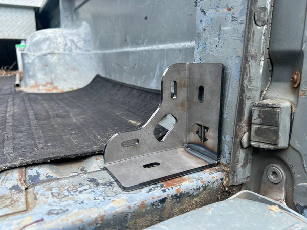 JC Customs Ford 80-97 F-Series Mini Bed Stiffeners/Tie-Downs bracket, steel, installed in the truck bed