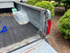 Ford 80-97 F-Series Mini Bed Stiffeners/Tie Downs JC Customs, gray metal with rust, tailgate hardware visible