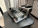 JC Customs OBS Ford F-Series shifter-mounted cup holder; dual chrome-ringed openings in silver bracket